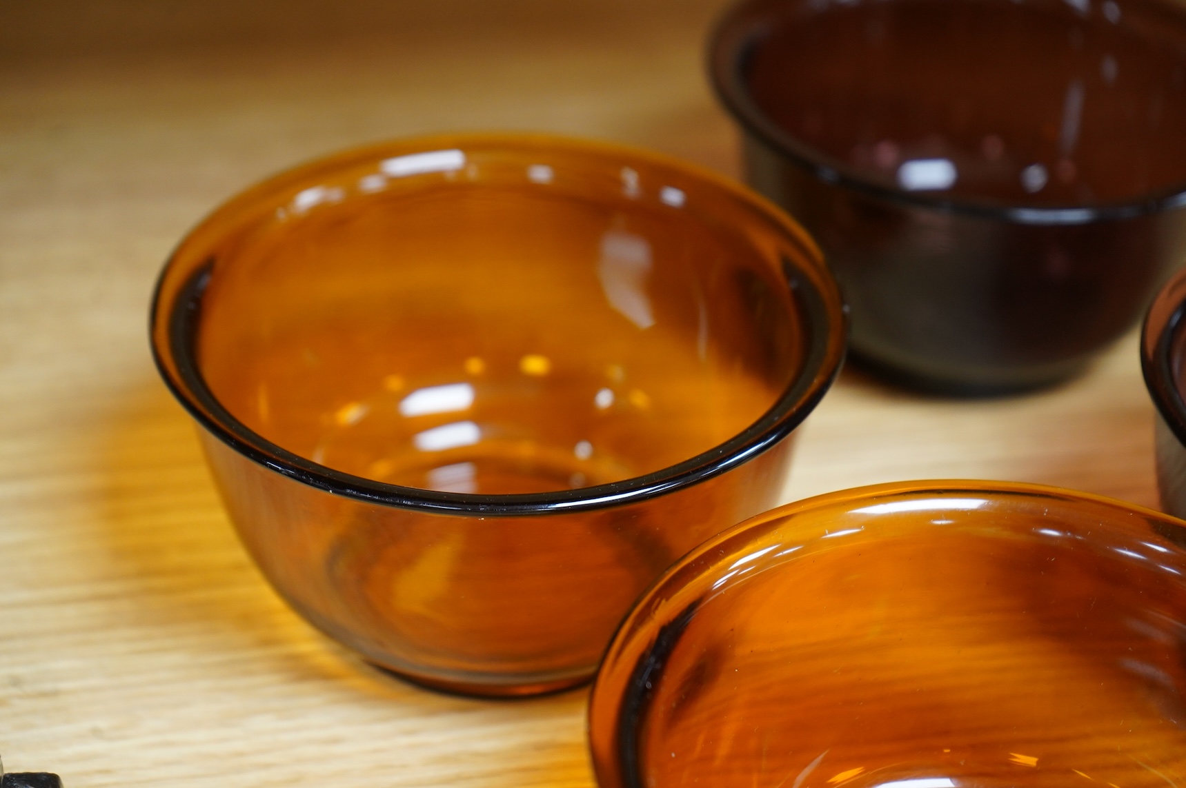 Two pairs of Chinese 'Peking' glass bowls, largest 11cm diameter